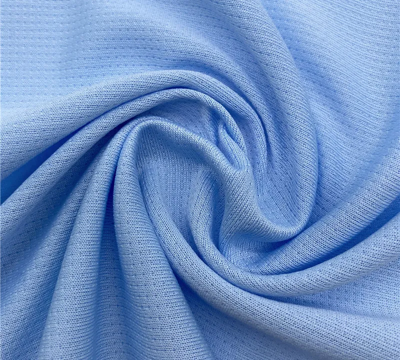 Polyester interlock pin dot hole mesh fabric for sportswear