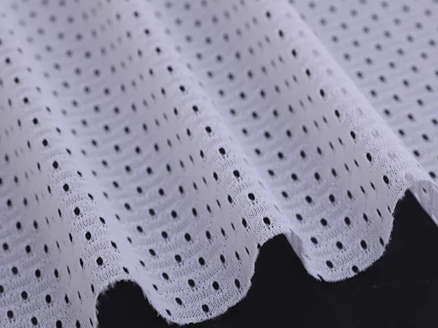 Polyester football eyelet mesh fabric for sports jerseys | Changle Textile