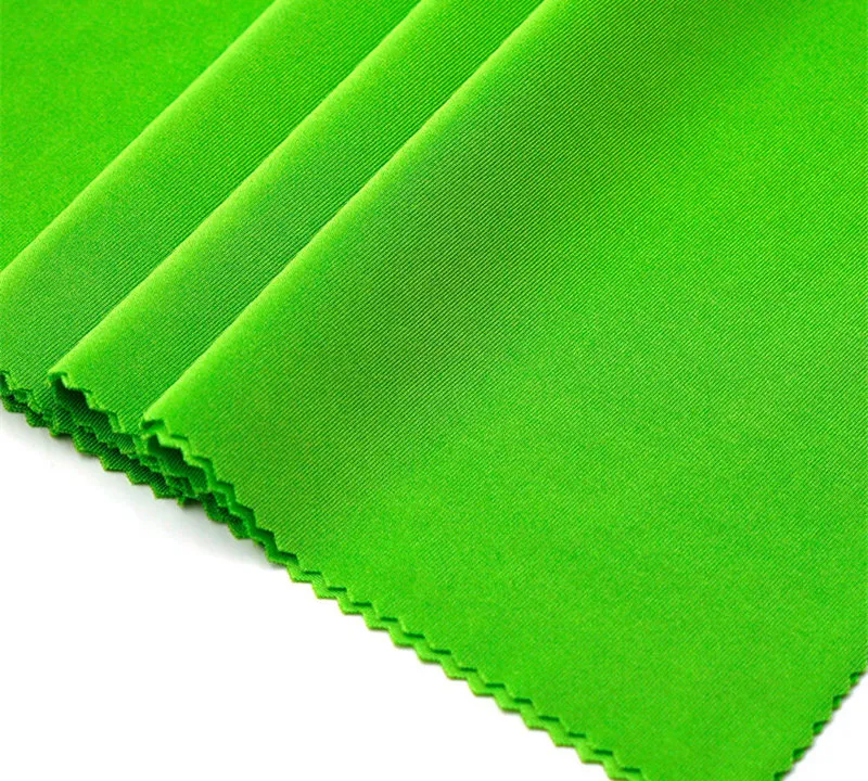Nylon spandex shiny four way stretch tricot fabric